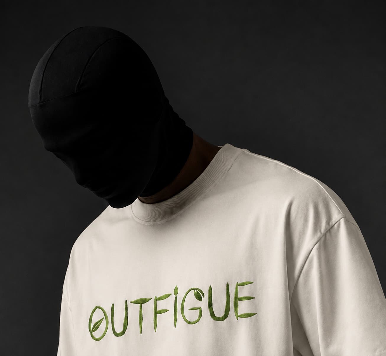 Outfigue Wordmark Tee — front print, close up